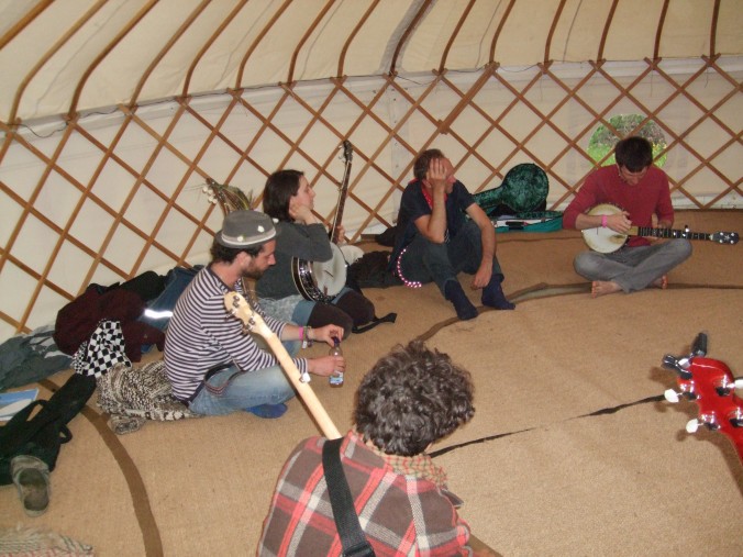 Adam Hurt (USA) teaching old time banjo inside the yurt at FiTM 2013